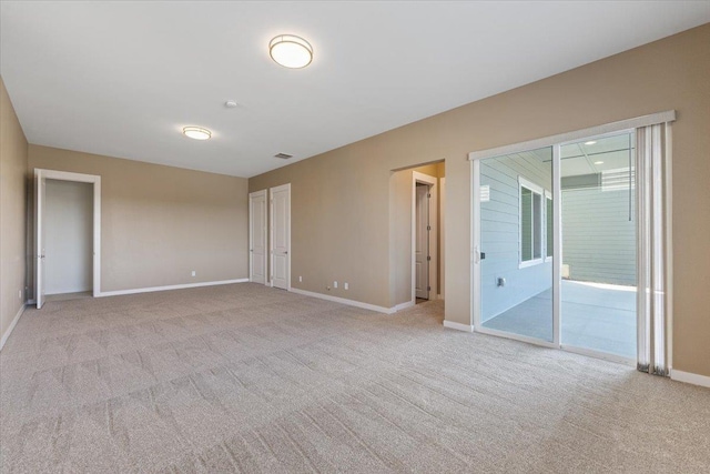 4756 W Lex Ave, Spokane, WA 99208 - empty room featuring baseboards and light carpet