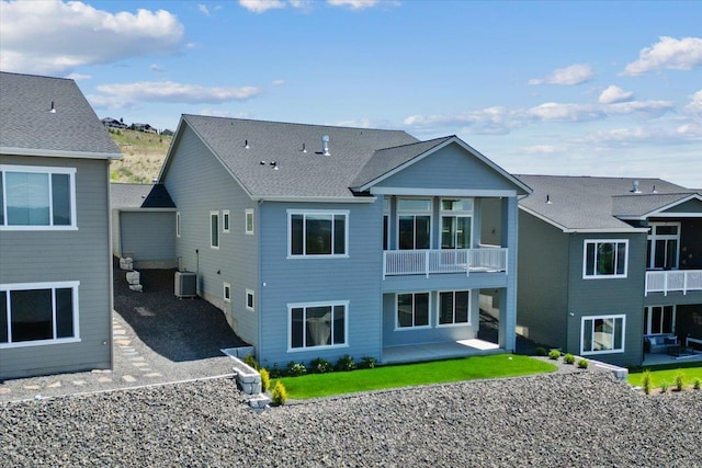 4756 W Lex Ave, Spokane, WA 99208 - back of property with a balcony, a patio, and central air condition unit