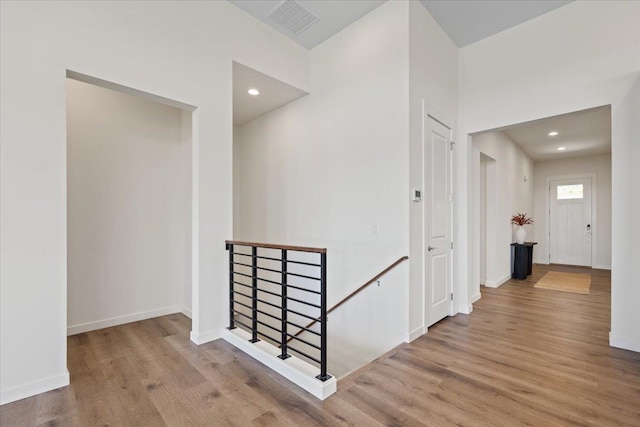 4756 W Lex Ave, Spokane, WA 99208 - hallway with an upstairs landing, wood finished floors, baseboards, and recessed lighting
