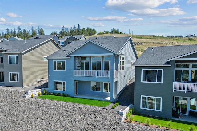 4756 W Lex Ave, Spokane, WA 99208 - rear view of house with a patio area and a balcony