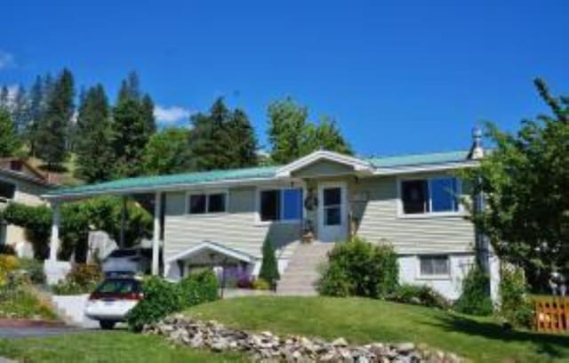 980 N Elm St, Colville, WA 99114 - view of front of house with a front yard