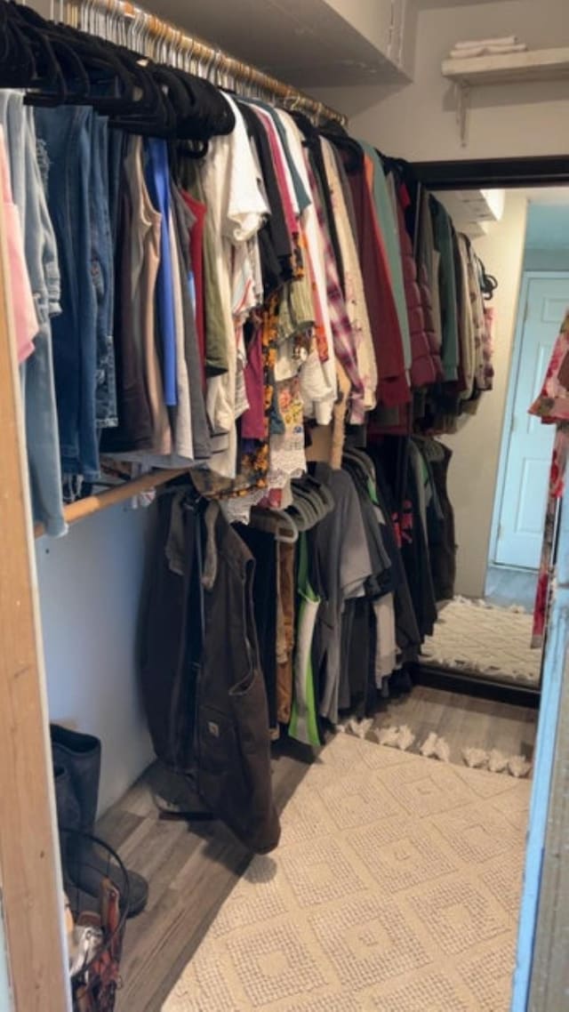 980 N Elm St, Colville, WA 99114 - spacious closet featuring wood finished floors