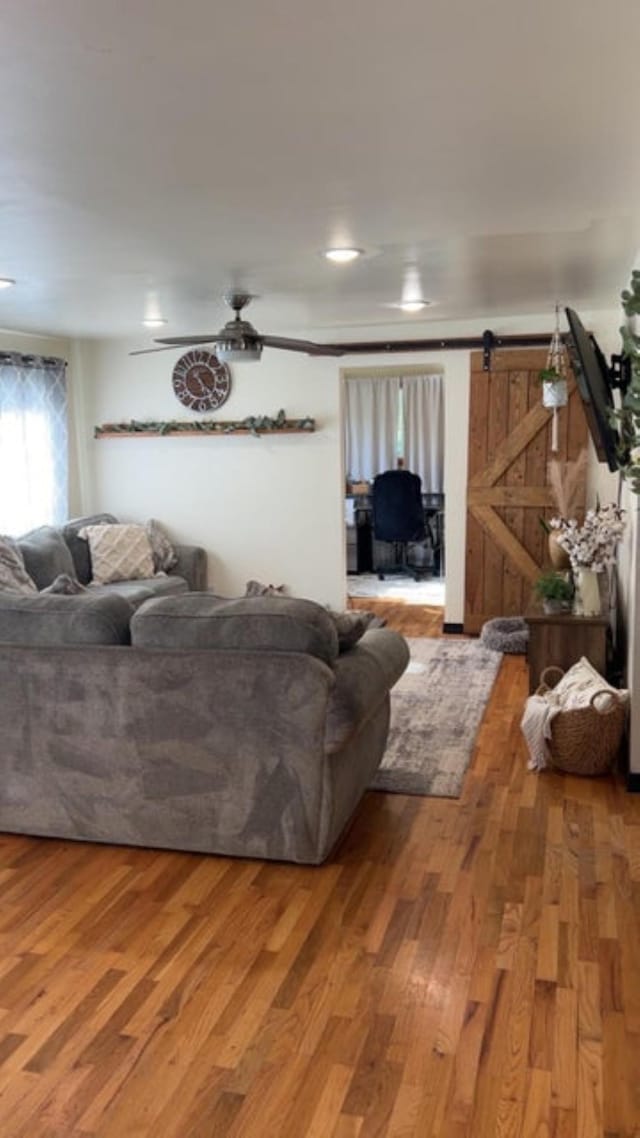 980 N Elm St, Colville, WA 99114 - living area featuring wood finished floors and a barn door