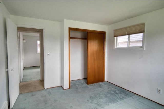 5516 N Fleming St, Spokane, WA 99205 - unfurnished bedroom featuring light carpet and a closet