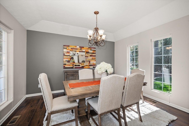 1216 W Candlewood Ct, Spokane, WA 99218 - dining room with a chandelier, dark wood-style floors, and baseboards