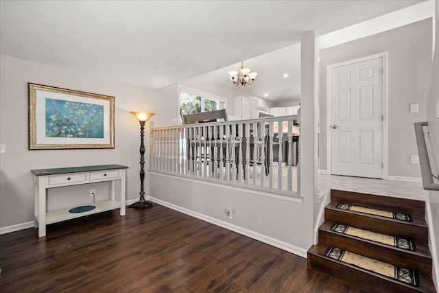 1216 W Candlewood Ct, Spokane, WA 99218 - stairway featuring wood finished floors, a chandelier, and baseboards