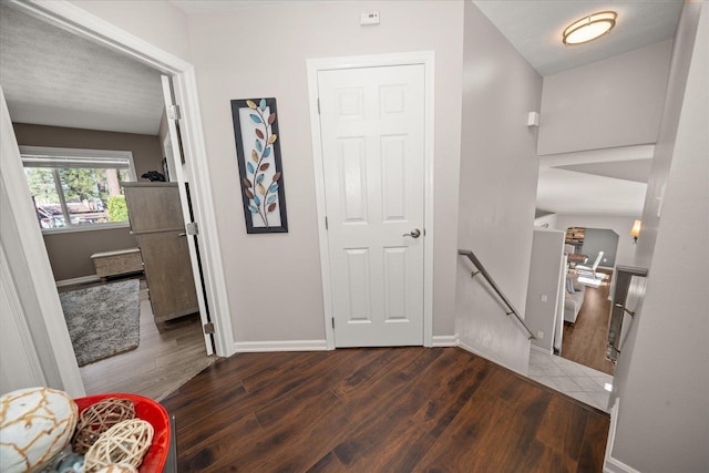 1216 W Candlewood Ct, Spokane, WA 99218 - corridor with an upstairs landing, wood finished floors, and baseboards