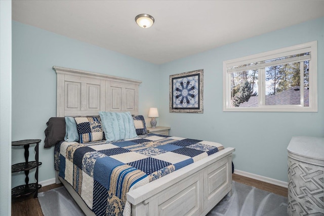 1216 W Candlewood Ct, Spokane, WA 99218 - bedroom featuring dark wood finished floors and baseboards