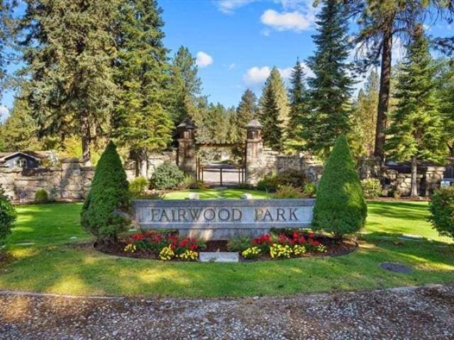 1216 W Candlewood Ct, Spokane, WA 99218 - community sign with a yard