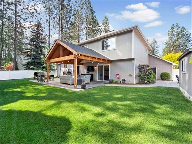 1216 W Candlewood Ct, Spokane, WA 99218 - rear view of house featuring outdoor lounge area, a patio area, and a gazebo