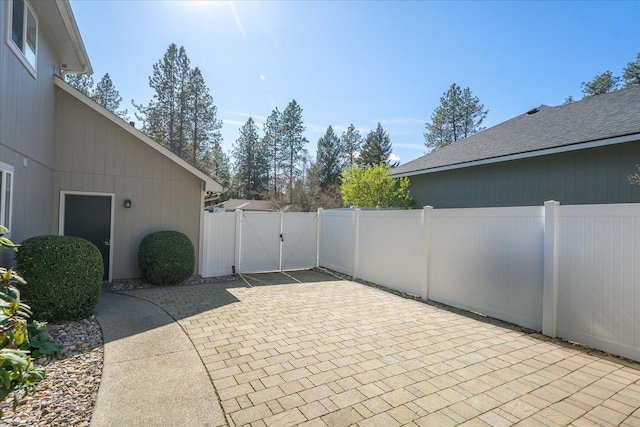 1216 W Candlewood Ct, Spokane, WA 99218 - view of patio / terrace featuring a gate