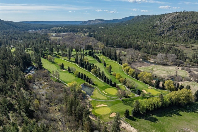 1216 W Candlewood Ct, Spokane, WA 99218 - aerial view of property's location with a forest, a mountainous background, and a golf club
