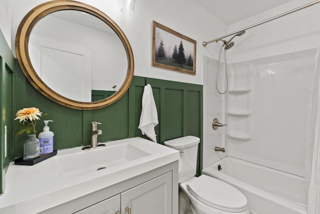 2419 C Indian Ridge Rd, Chewelah, WA 99109 - bathroom featuring toilet, vanity, washtub / shower combination, and a decorative wall