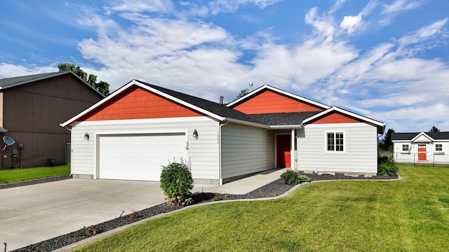 1002 N Oasis Ave, Deer Park, WA 99006 - ranch-style house with a garage and concrete driveway