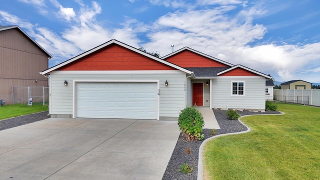 1002 N Oasis Ave, Deer Park, WA 99006 - view of front facade featuring a garage and concrete driveway