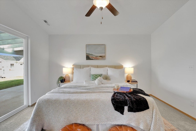 1002 N Oasis Ave, Deer Park, WA 99006 - carpeted bedroom featuring access to outside, baseboards, and a ceiling fan