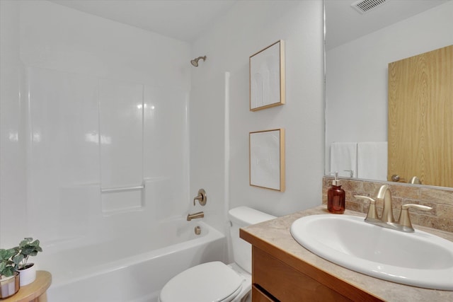 1002 N Oasis Ave, Deer Park, WA 99006 - full bath featuring vanity, toilet, shower / bath combination, and decorative backsplash