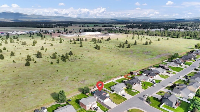 1002 N Oasis Ave, Deer Park, WA 99006 - aerial view of property's location featuring a mountainous background
