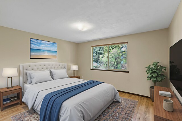 3424 E 32nd Ave, Spokane, WA 99223 - bedroom featuring light wood-style floors and baseboards
