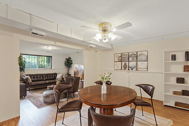 3424 E 32nd Ave, Spokane, WA 99223 - dining area with light wood finished floors and a ceiling fan