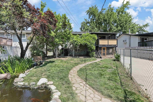 3424 E 32nd Ave, Spokane, WA 99223 - view of yard featuring stairs and a wooden deck