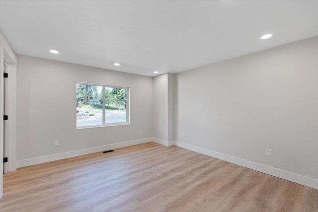 12510 N Craig Rd, Nine Mile Falls, WA 99026 - spare room featuring recessed lighting, light wood finished floors, and baseboards