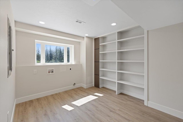 12510 N Craig Rd, Nine Mile Falls, WA 99026 - unfurnished bedroom featuring baseboards, wood finished floors, and recessed lighting