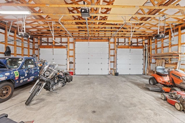 611 E Mill St, Latah, WA 99018 - garage featuring a garage door opener
