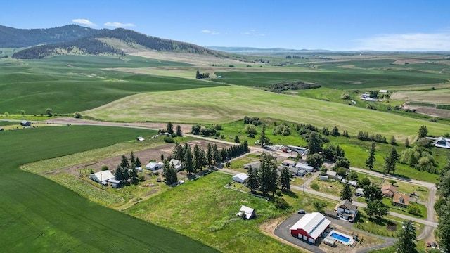 611 E Mill St, Latah, WA 99018 - aerial overview of property's location with a mountainous background