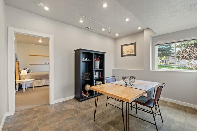 526 W Willapa Ct, Spokane, WA 99224 - dining room featuring baseboards, recessed lighting, and a textured ceiling