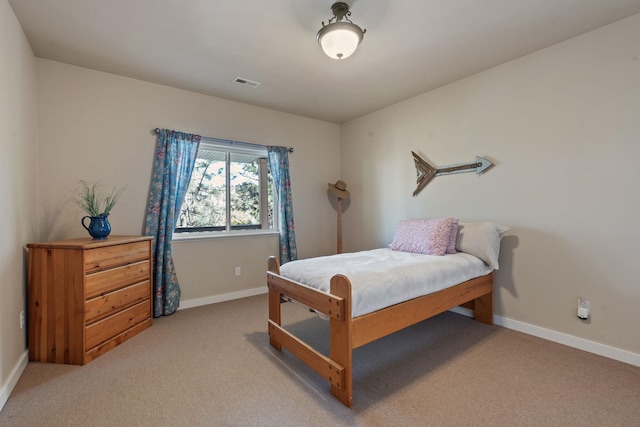 526 W Willapa Ct, Spokane, WA 99224 - bedroom with baseboards and light colored carpet