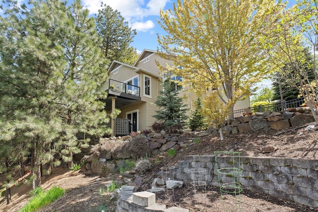 526 W Willapa Ct, Spokane, WA 99224 - view of home's exterior with a balcony