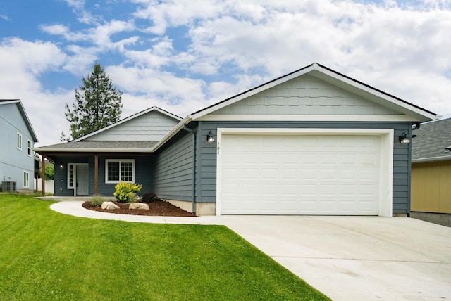 704 E Canterbury Ln, Colbert, WA 99005 - ranch-style home featuring driveway, a front yard, a garage, and cooling unit