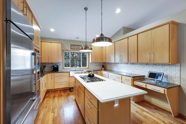 13906 E 39th Ln, Veradale, WA 99037 - kitchen with appliances with stainless steel finishes, light brown cabinets, a sink, light wood-style flooring, and recessed lighting