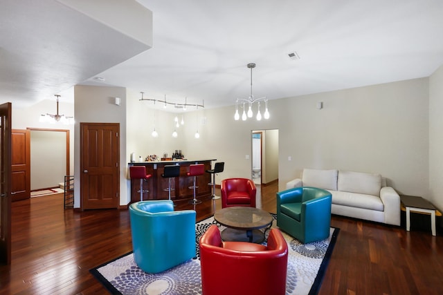 13906 E 39th Ln, Veradale, WA 99037 - living room with a chandelier, a dry bar, and dark wood-style floors