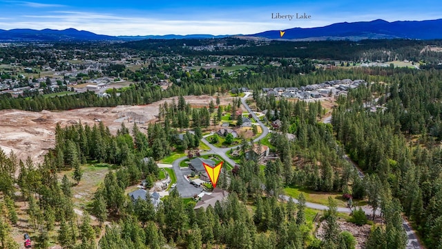 13906 E 39th Ln, Veradale, WA 99037 - aerial view of property's location featuring a mountain backdrop and a forest