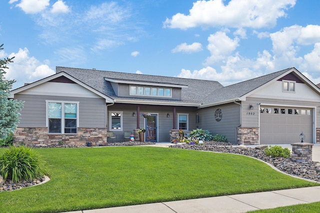 1002 N High Desert Dr, Deer Park, WA 99006 - view of front of property with an attached garage, a front yard, stone siding, and a shingled roof