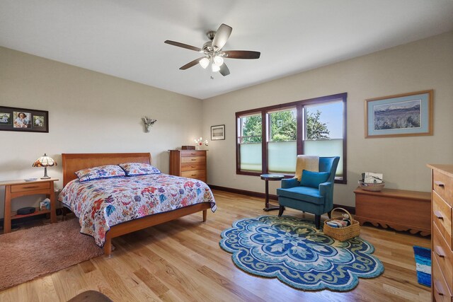 1002 N High Desert Dr, Deer Park, WA 99006 - bedroom with light wood-style flooring, ceiling fan, and baseboards