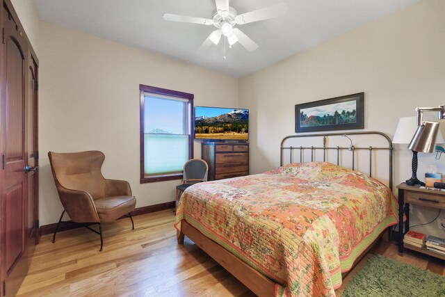 1002 N High Desert Dr, Deer Park, WA 99006 - bedroom featuring light wood finished floors, baseboards, and a ceiling fan