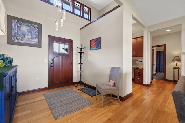 1002 N High Desert Dr, Deer Park, WA 99006 - foyer with baseboards, light wood-type flooring, and a towering ceiling