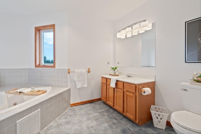 609 E Wild Rose Rd, Colbert, WA 99005 - full bath with toilet, vanity, a tub with jets, and baseboards