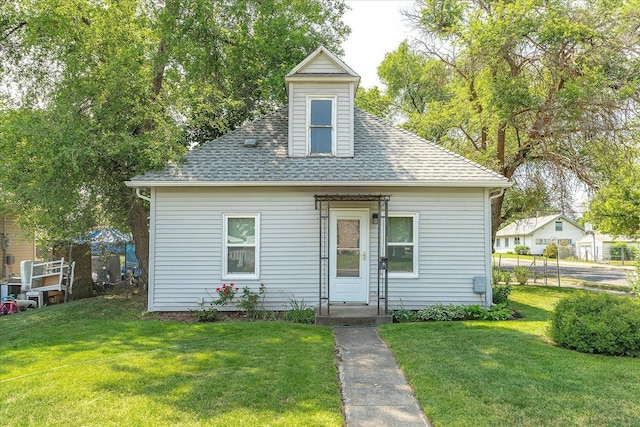 2304 E Dalke Ave, Spokane, WA 99207 - bungalow featuring a front lawn and roof with shingles