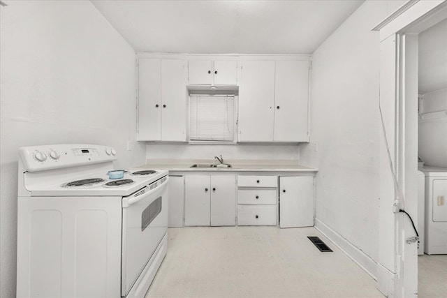 2304 E Dalke Ave, Spokane, WA 99207 - kitchen featuring white electric range oven, white cabinets, light countertops, and a sink