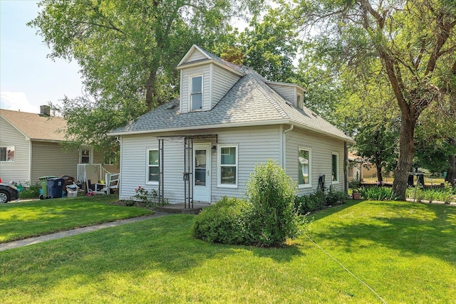 2304 E Dalke Ave, Spokane, WA 99207 - view of front facade with a front yard and roof with shingles