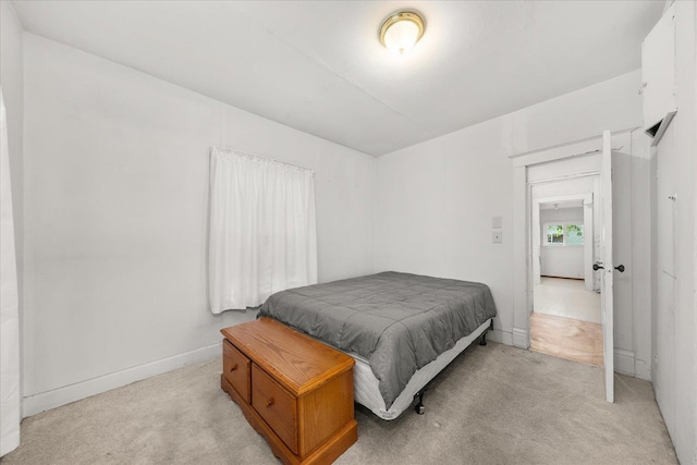 2304 E Dalke Ave, Spokane, WA 99207 - bedroom featuring light carpet and baseboards