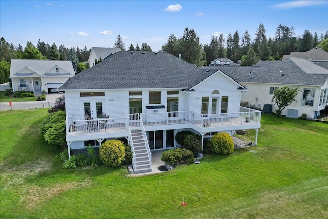 7920 S Parway Ln, Cheney, WA 99004 - rear view of property featuring french doors, stairway, a wooden deck, and a yard