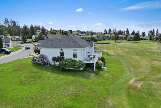 7920 S Parway Ln, Cheney, WA 99004 - rear view of house featuring a residential view, a lawn, a deck, and central air condition unit