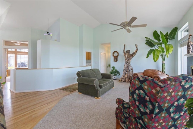 7920 S Parway Ln, Cheney, WA 99004 - living room with wood finished floors, a ceiling fan, and high vaulted ceiling