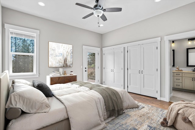 40083 Lake Terrace Ct, Loon Lake, WA 99148 - bedroom with multiple windows, access to outside, connected bathroom, multiple closets, and recessed lighting