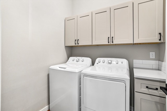 40083 Lake Terrace Ct, Loon Lake, WA 99148 - laundry area featuring cabinet space and washer and dryer